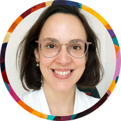 Portrait of a smiling fair-skinned woman with dark shoulder-length hair, wearing glasses and a white top, set against a light background, surrounded by a colorful circular border.